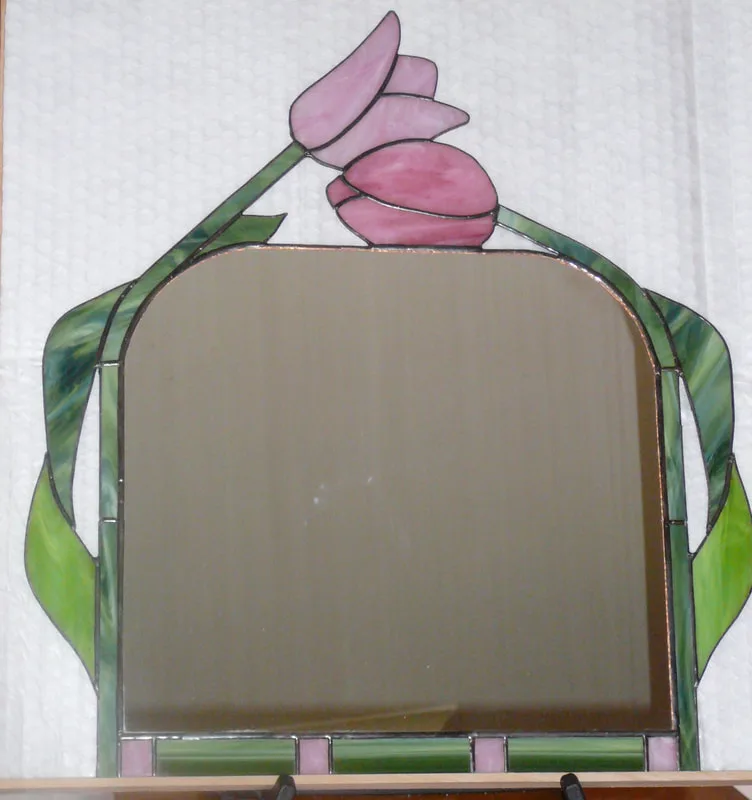 A stained glass design (by Sallie Butterfield), featuring tulips