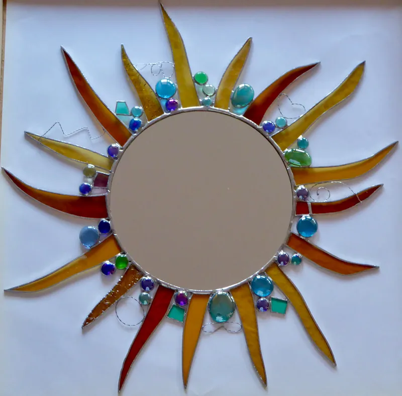 A stained glass window feature (by Sallie Butterfield), a sunburst with circular mirror